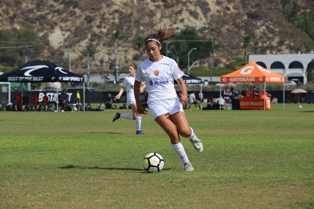 Claire Carpita playing soccer as a child